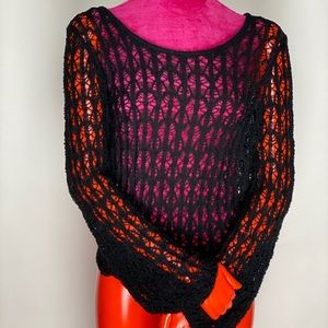 Black crotchet sweater.